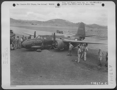 The Douglas A-20 "Little Hellion #13" of the 89th Bomb Squadron, 3rd Attack Group, which crash landed at an air base near Port Moresby, Papua, New Guinea. 1 November 1942. (U.S. Air Force Number 77817AC)