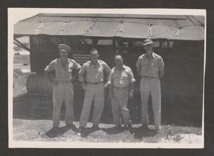 [Four Soldiers in Front of Temporary Building]