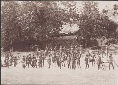 Islanders on the shore of Nondu, Te Motu, Santa Cruz Group, Solomon Islands, 1906 / J.W. Beattie
