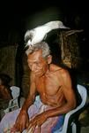 Kaua Sare with pet bird on his head