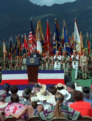 President William Jefferson Clinton speaks at the Joint Service review at Wheeler Army Air Field during the ceremony to commemorate the 50th anniversary of the end of World War II
