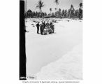 Radiological Survey party taking first radiation readings on Bikini Island beach, July 15, 1947