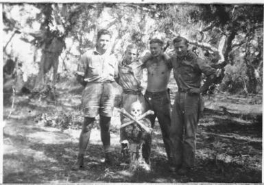 Jack Arden (second from the right) with three other soldiers,  all are members of the 2/3rd Australian Independent Company, [New Guinea, July, 1943]