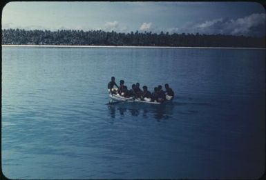 A canoe approaching the main island of the atoll (2) : Mortlock Islands, Papua New Guinea, 1960 / Terence and Margaret Spencer