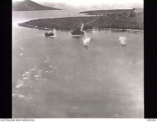 HANSA BAY, NEW GUINEA. 1943-08-28. SECOND OF A SERIES OF FIVE GRAPHIC PHOTOGRAPHS TAKEN FROM A RAAF PLANE DURING THE BOMBING OF A JAPANESE SUPPLY CRAFT, ILLUSTRATING THE CONSEQUENCES OF FOLLOWING A ..