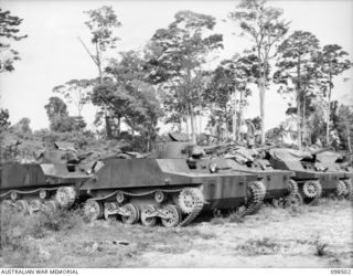 PANIPAI AIRSTRIP, NEW IRELAND. 1945-10-26. JAPANESE AMPHIBIOUS TANKS ON THE AIRSTRIP, WHICH IS ABOUT SIX MILES FROM KAVIENG. AN AUSTRALIAN NEW GUINEA ADMINISTRATIVE UNIT ADMINISTRATIVE HEADQUARTERS ..