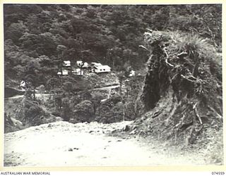 NEW GUINEA. 1944-07-09. SECOMBE CAMP ON THE WAU-BULLDOG ROAD. THIS CAMP HOUSES THE ROYAL AUSTRALIAN ENGINEERS WHO ARE BUILDING THIS VERY IMPORTANT HIGHWAY