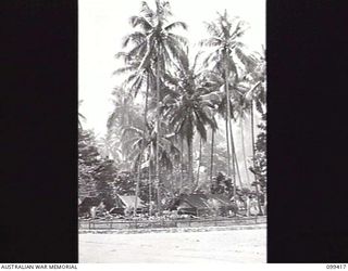 RABAUL, NEW BRITAIN, 1945-12-12. THE MAIN ENTRANCE TO 28TH INFANTRY BATTALION CAMP AREA