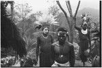 Pig festival, singsing, Kwiop: men with feather headdresses, face paint and kina shell pendants