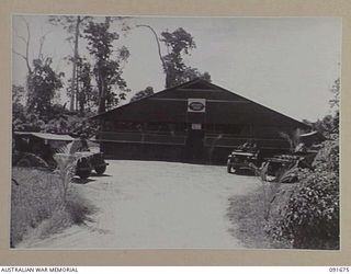 TOROKINA, BOUGAINVILLE. 1945-05-07. EXTERIOR VIEW OF ENTRANCE TO 4 SECTION OFFICERS' SHOP