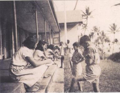 Seniors test Juniors in spelling, 1950s