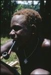 Portrait of young man with pipe