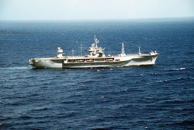 A starboard beam view of the amphibious command ship USS BLUE RIDGE (LCC-191) underway in the Mariana Islands near Guam during exercise Tempo Brave '94. The BLUE RIDGE is the Seventh Fleet flagship and is forward deployed to Yokosuka, Japan