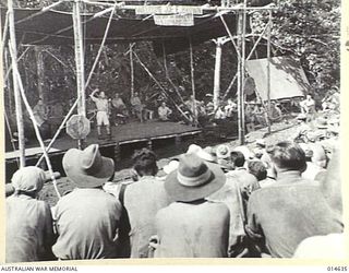 1943-04-13. NEW GUINEA. FILM STAR JOE E. BROWN ENTERTAINS AUSTRALIAN AND AMERICAN TROOPS. (NEGATIVE BY N. BROWN)