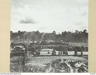 LAE, NEW GUINEA. 1944-09-27. A SECTION OF A PETROL AND OIL DUMP AT THE 43RD FIELD ORDNANCE DEPOT