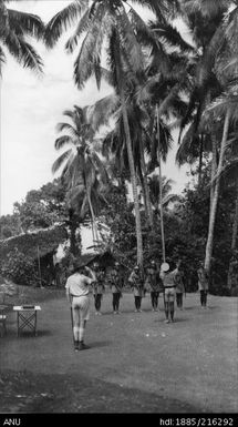 Patrol officer Wright taking salute at Trikimun  7 Aug 1937 12.30 pm