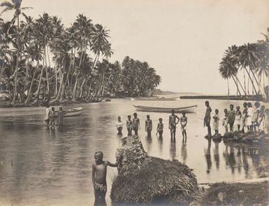 Children standing in a bay. From the album: Photographs of Apia, Samoa