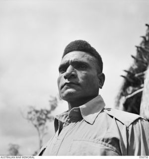 BISIATABU, NEW GUINEA. 1943-10-26. 7 SERGEANT KARI MM, 1ST PAPUAN INFANTRY BATTALION, WHO RECEIVED HIS DECORATION UNDER THE FOLLOWING CIRCUMSTANCES - "ON THE 1943-01-18, AT SABARI, THIS NCO WAS IN ..