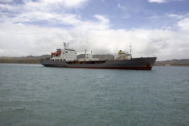 A starboard side view showing the Russian Federated Navy (RFN) Dubna Class Replenishment Oiler, PECHENGA, as it navigates the waters at Apra Harbor, Guam (GU). The ship is one of four RFN Ships participating with two US Navy ships in Passing Exercise 2006 (PASSEX 06) off the coast of Guam. PASSEX 06 is an exercise designed to increase interoperability between the two navies while enhancing the strong cooperative relationship between Russia and the United States