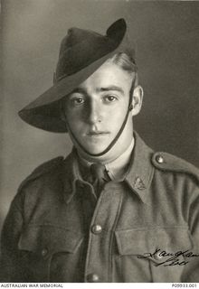 Studio portrait of WX17560 Private (Pte) Thomas Henry McCann, 2/11 Infantry Battalion.  Pte McCann was a shop assistant from West Leederville, Western Australia, prior to enlistment on 5 November ..