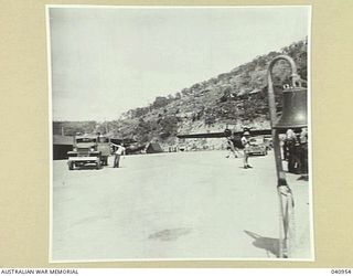 Port Moresby, New Guinea. 1944-01-11. The hardstanding area at the Royal Australian Air Force Marine Section. Two Catalina aircraft are parked in the background