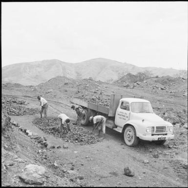 Miners loading rocks into a truck, Fiji, 1966 / Michael Terry