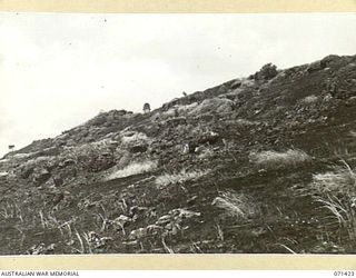 FORTIFICATION POINT, NEW GUINEA. 1944-03-21. THE ROCKY TYPE OF COUNTRY AT FORTIFICATION POINT WITHIN THE AREA OF HEADQUARTERS, 2ND AUSTRALIAN CORPS