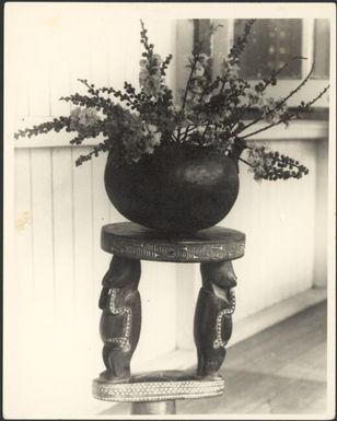 New Guinea flowers in a New Guinea pot on a Trobriand Island stool, New Guinea, ca. 1929 / Sarah Chinnery