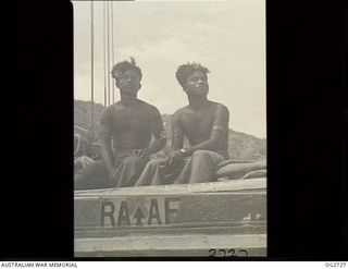 PORT MORESBY, PAPUA. C. 1944. PAPUAN NATIVES EMPLOYED AS CREW MEMBERS ON A SAILING VESSEL OF THE RAAF RESCUE SERVICE