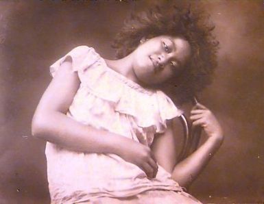 Samoan girl with cane chair