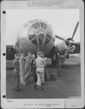 Major General Emmett O'Donnell Talks With Some Of His Crew As They Await Signal To Take Off In The Boeing B-29 'Dauntless Dotty' For A Bombing Mission Over Tokyo, Japan. Saipan, Marianas Islands, November 1944. (U.S. Air Force Number A64263AC)