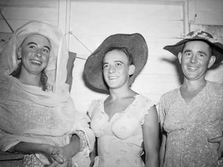 PAPUA, NEW GUINEA. 1942-07. THREE VERY SNAPPY CHORUS GIRLS-AUSTRALIAN ARMY ISSUE: THESE THREE LADS OF THE PORT MORESBY CONCERT PARTY "MAKE-UP" FOR THEIR PARTS IN THE SHOW PRESENTED BY THE PARTY ..