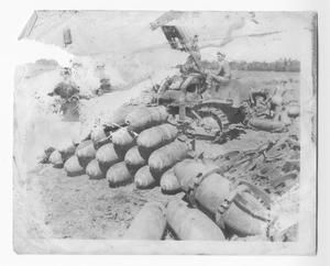 [Stacked Munition and Servicemen]