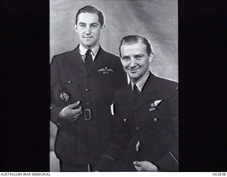 London, England. C. 1945-05. Portrait of 417235 Flight Lieutenant W. F. Rabbitt DFC of Crystal Brook, SA (left), and 426177 Flying Officer B. G. Spiller DFC of Samarai, New Guinea (right) taken at ..