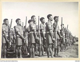 WEWAK, NEW GUINEA. 1945-10-26. A CEREMONIAL PARADE AND MARCH PAST BY 6 DIVISION WAS INSPECTED BY GENERAL SIR THOMAS A. BLAMEY, COMMANDER-IN-CHIEF, ALLIED LAND FORCES, SOUTH WEST PACIFIC AREA, AT ..