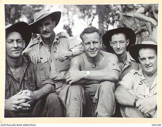 TOROKINA, BOUGAINVILLE. 1945-07-26. THE FIRST CONTINGENT OF "FIVE YEAR RELEASE PERSONNEL" TO LEAVE FOR THE RETURN TO AUSTRALIA. ALL THESE MEN HAVE COMPLETED FIVE YEARS IN THE ARMY AND ARE BEING ..