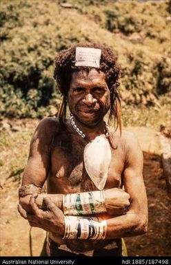 Man with beer can arm decorations