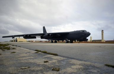 The first of six US Air Force (USAF) B-52 Stratofortress bombers from Minot Air Force Base (AFB), North Dakota (ND) taxis to their parking spaces after landing at Andersen Air Force Base (AFB), Guam (GU) in support of the US Pacific Command's (PACOM) request for a rotational bomber force