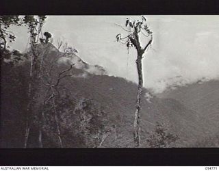 BULLDOG ROAD, NEW GUINEA, 1943-07-17. LOOKING DOWN THE CLOUD TOPPED ELOA VALLEY FROM BANNON'S LOOKOUT