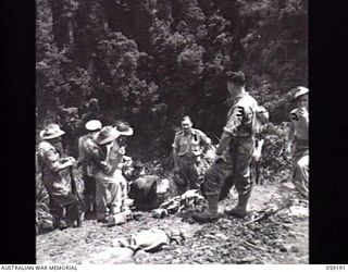 LALOKI VALLEY, NEW GUINEA. 1943-11-05. A PATROL FROM THE NEW GUINEA FORCE TRAINING SCHOOL (JUNGLE WING) ON AN EXERCISE NEAR THE ROUNA FALLS. SHOWN: VX50370 LIEUTENANT J. D. BRENNAN (1); VX52692 ..