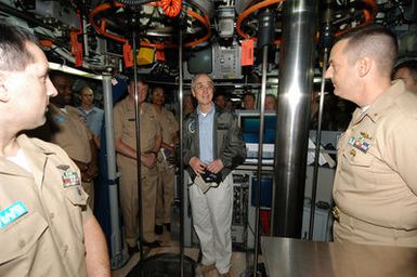US Secretary of the Navy (SECNAV), The Honorable Gordon R. England (center) speaks to Sailors on board the US Navy (USN) LOS ANGELES CLASS: Attack Submarine, USS CHARLOTTE (SSN 766), during a visit to the Naval Submarine Base at Pearl Harbor, Hawaii (HI)
