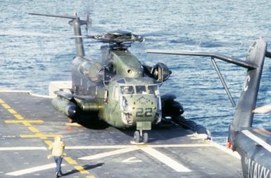 A CH-53 Sea Stallion helicopter on the flight deck of the amphibious assault ship USS GUAM (LPH-9) during operations off the coast of Beirut, Lebanon