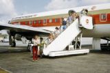 Federated States of Micronesia, people exiting plane at airport on Yap Island