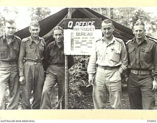 DUMPU, NEW GUINEA. 1944-01-25. THE QUARTERMASTERS STAFF AT HEADQUARTERS 7TH DIVISION. IDENTIFIED PERSONNEL ARE: QX48823 PRIVATE R.G. CUMMINGS (1); SX2083 PRIVATE A.W. HALLETT (2); NX12770 SERGEANT ..