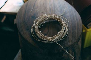 Woven cord on tuluma (fishing box), Atafu, Tokelau