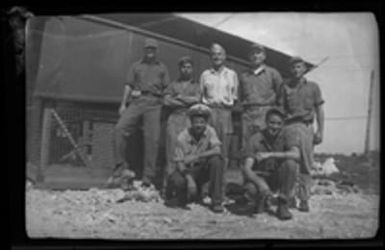 [Servicemen at military base]