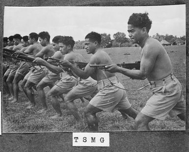 Members of the Tonga Defence Force of 2nd NZEF, training with Thompson sub machine guns in Tonga