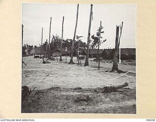 WIRUI BEACH, WEWAK AREA, NEW GUINEA. 1945-09-05. THE GENERAL CAMP AREA, INCLUDING THE TRANSPORT LINES, OF 2/4 INFANTRY BATTALION