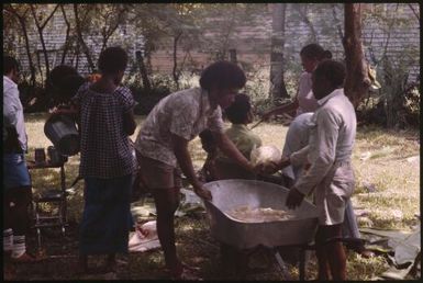 Malaria Control Service national staff prepare an earth oven for a party (2) : Papua New Guinea, 1976-1978 / Terence and Margaret Spencer