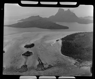 Bora Bora, Society Islands, French Polynesia, showing lagoon and barrier reef